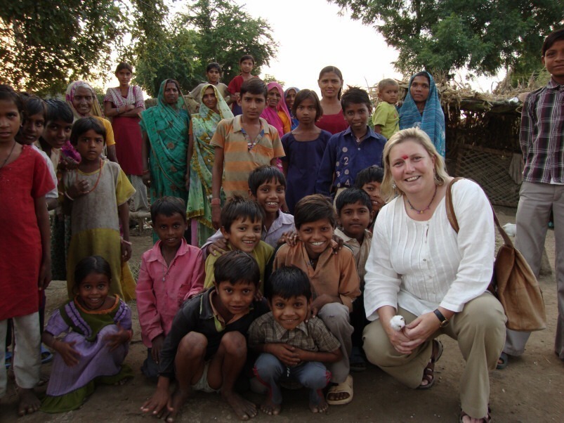 Director, Susan Waters, with school children of cotton farmers in India back in 2010