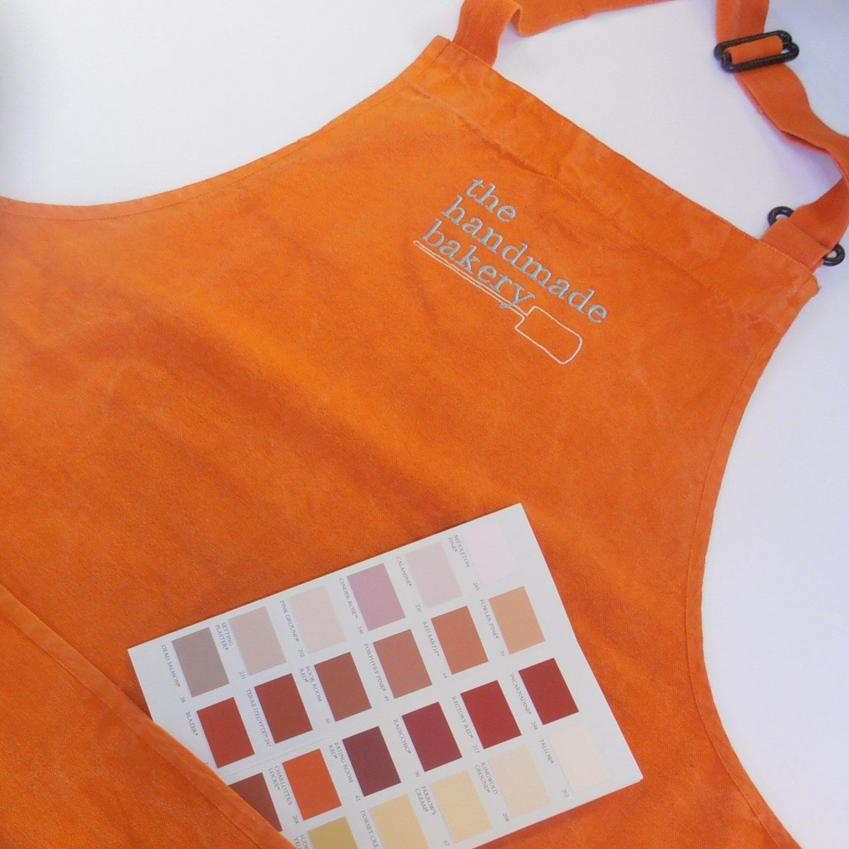 Fabric dyed to Pantone or CMYK matched custom coloured aprons